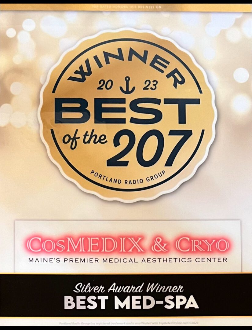 A gold and black award with the words " winner best of 2 0 7 " on it.